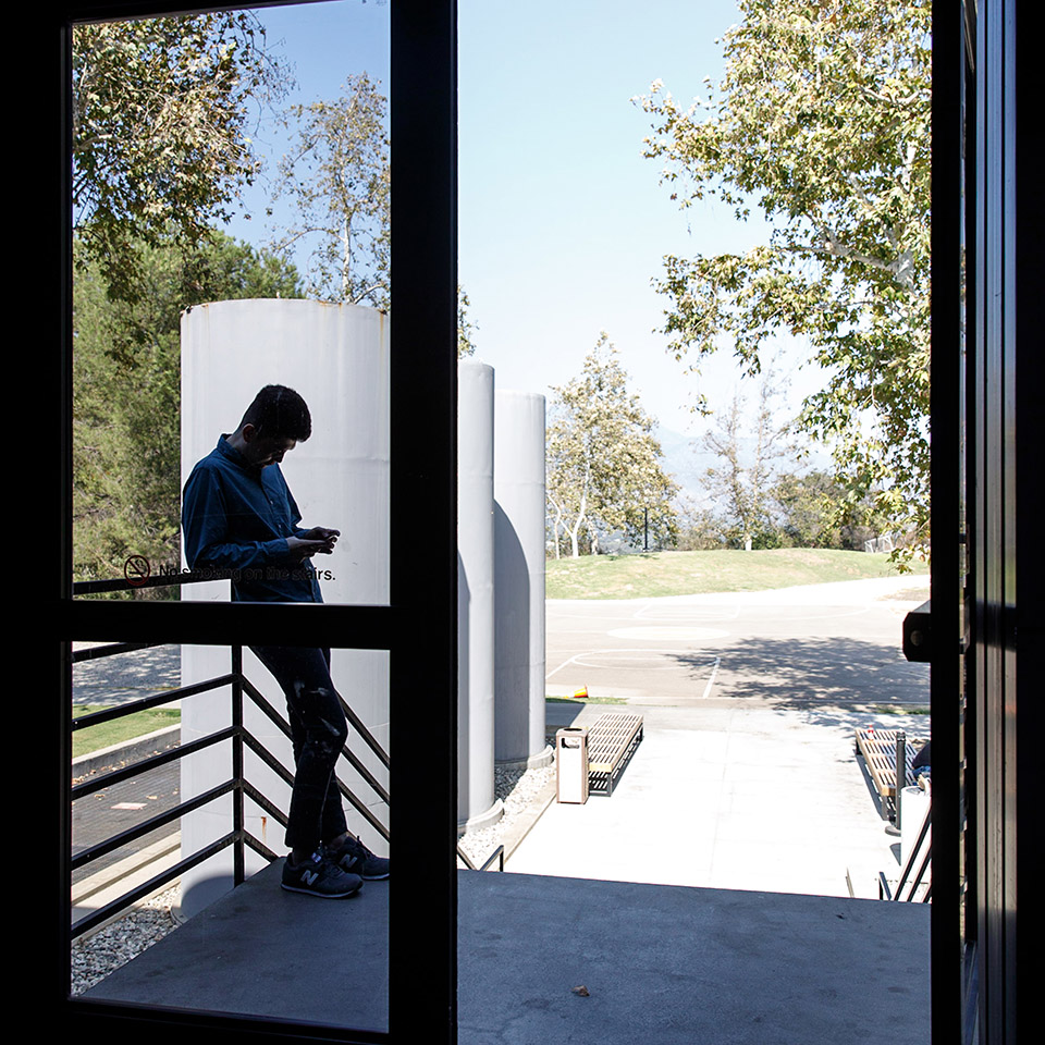 student silhouette in doorway