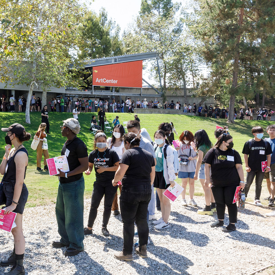 students line up outside building