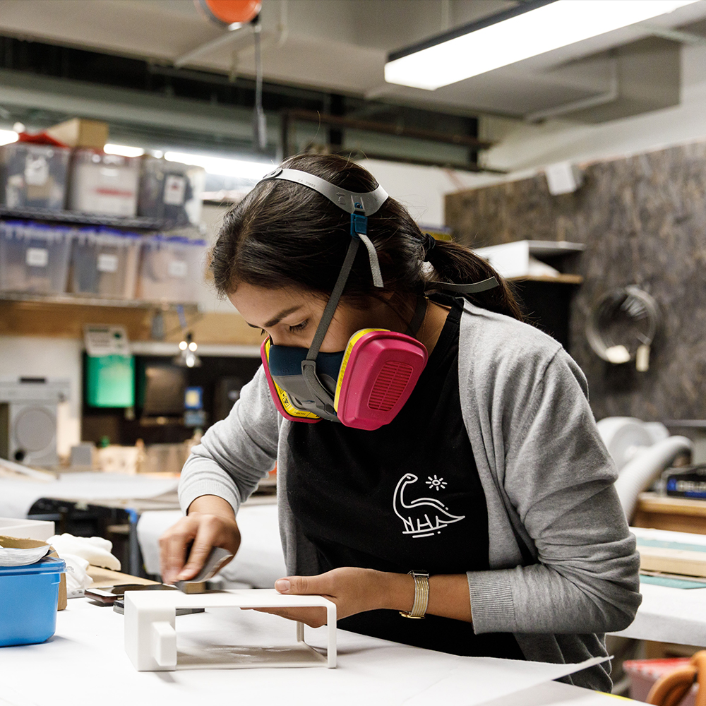 Student working on a project in the shop